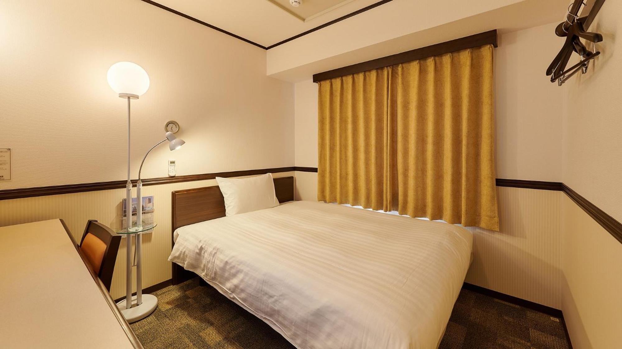 Toyoko Inn Fukuyama-Eki Shinkansen Minami-Guchi Rom bilde