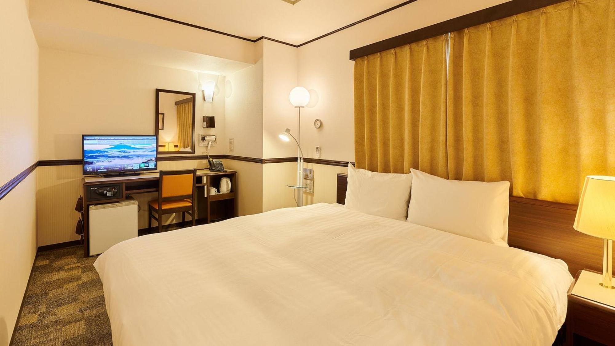 Toyoko Inn Fukuyama-Eki Shinkansen Minami-Guchi Rom bilde