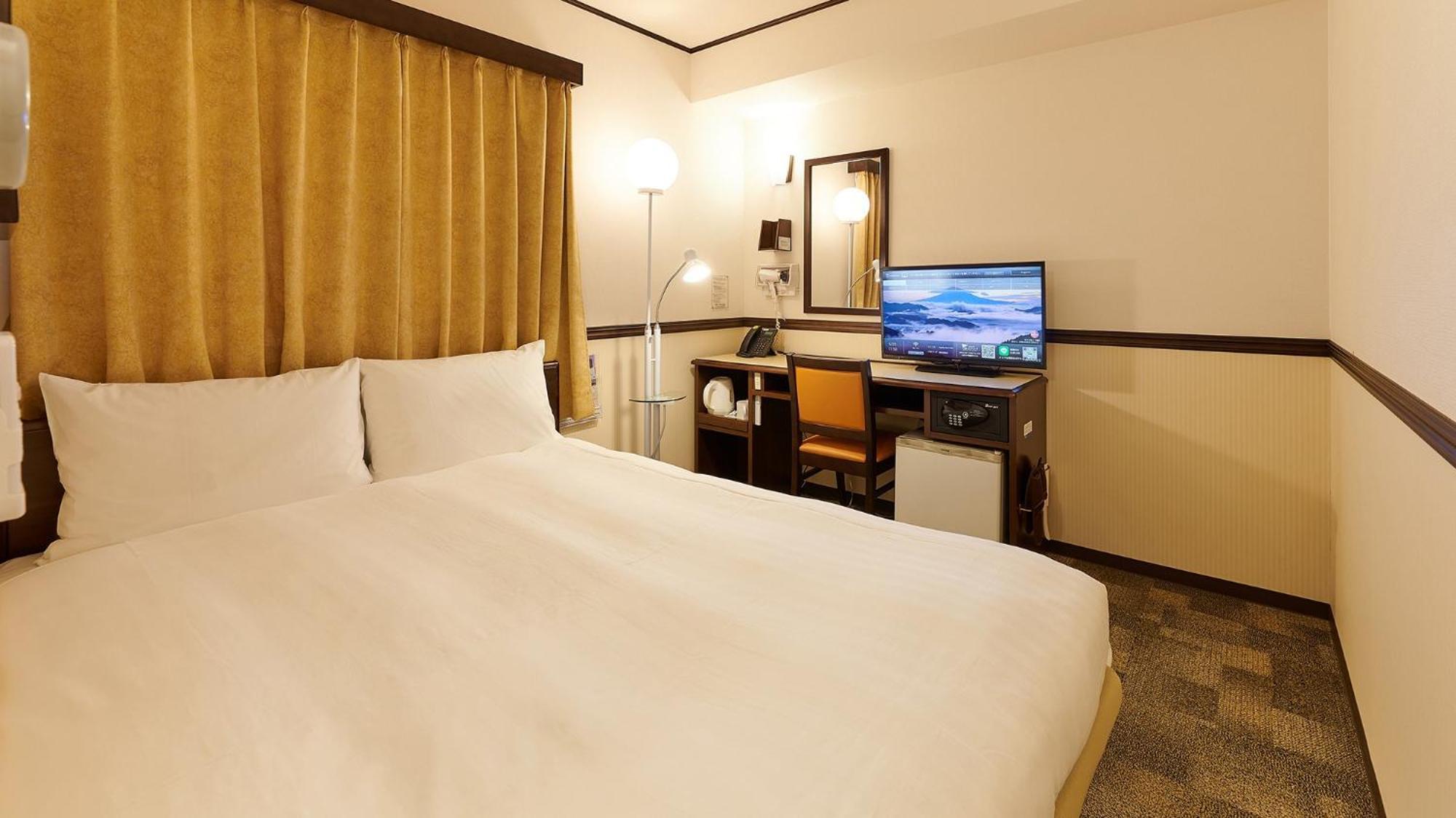 Toyoko Inn Fukuyama-Eki Shinkansen Minami-Guchi Rom bilde