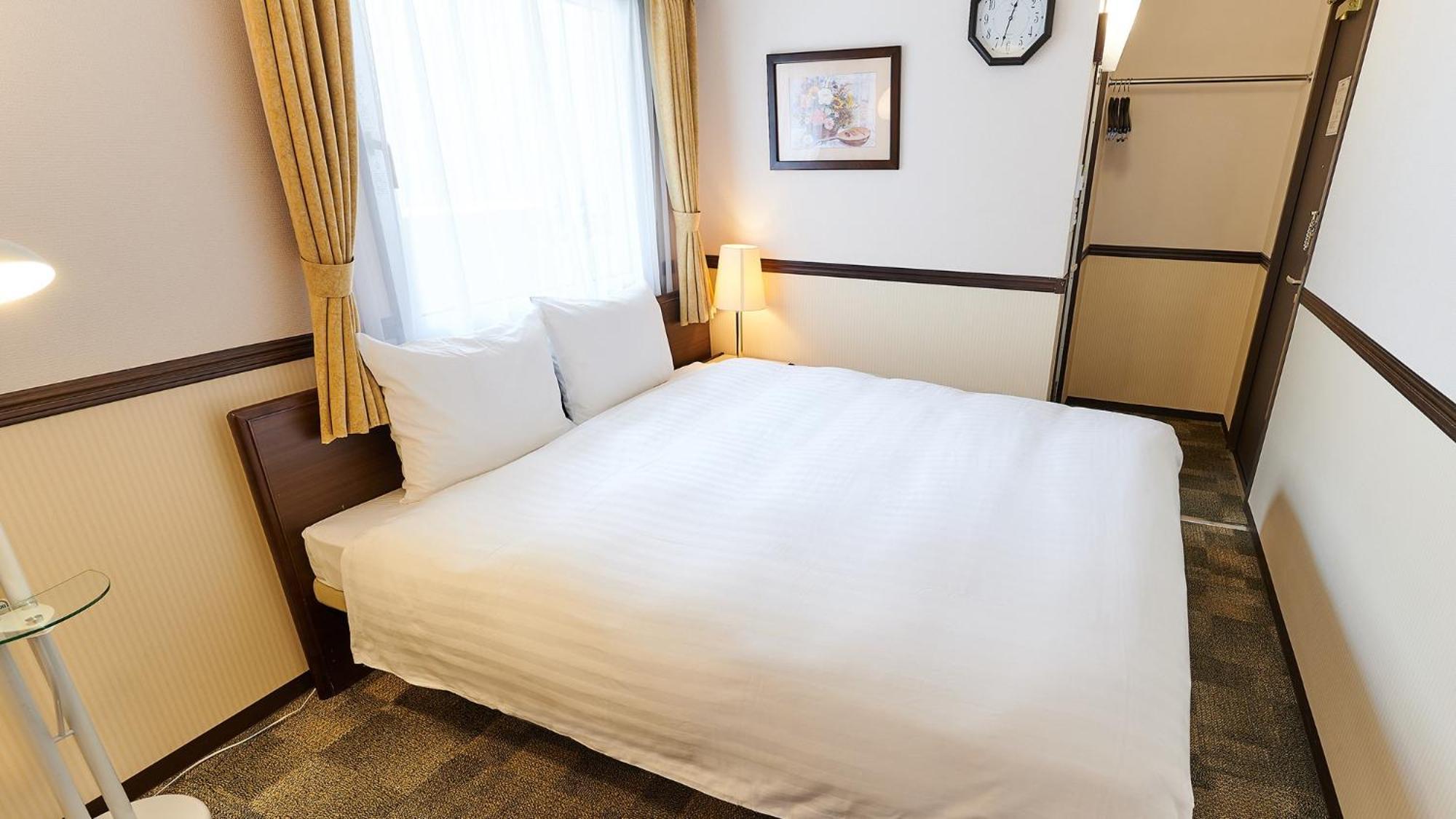 Toyoko Inn Fukuyama-Eki Shinkansen Minami-Guchi Rom bilde