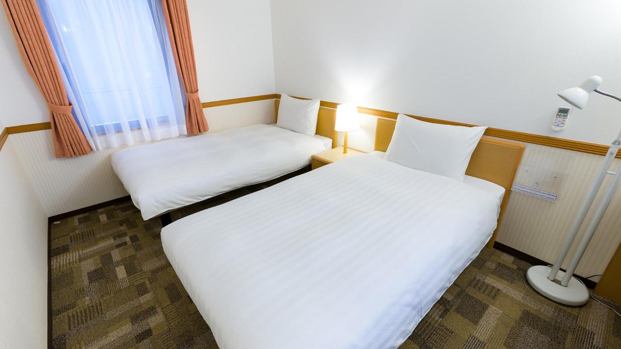 Toyoko Inn Fukuyama-Eki Shinkansen Minami-Guchi Rom bilde
