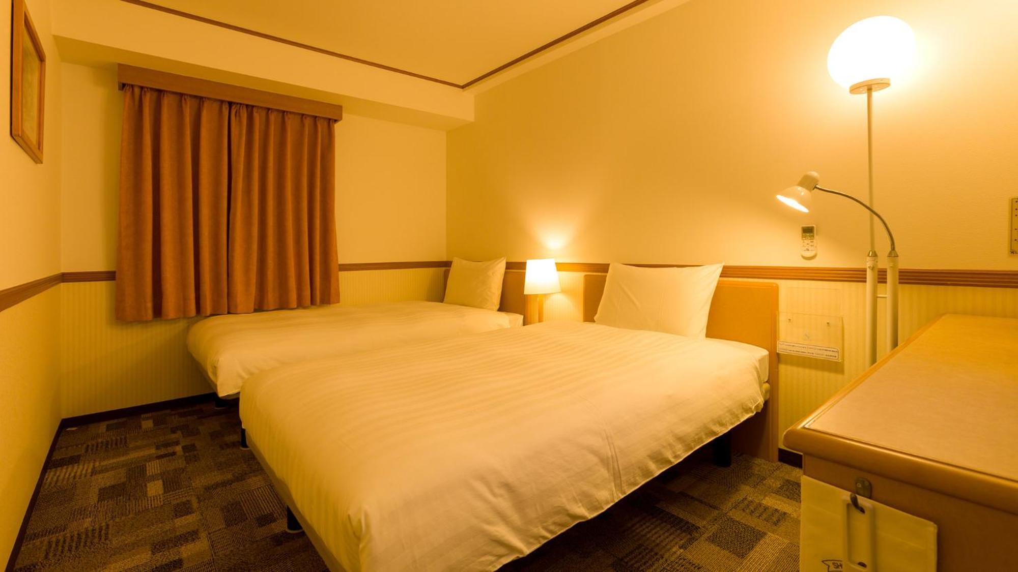 Toyoko Inn Fukuyama-Eki Shinkansen Minami-Guchi Rom bilde